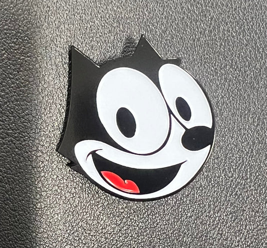 Closeup of Classic Felix collectible enamel style pin