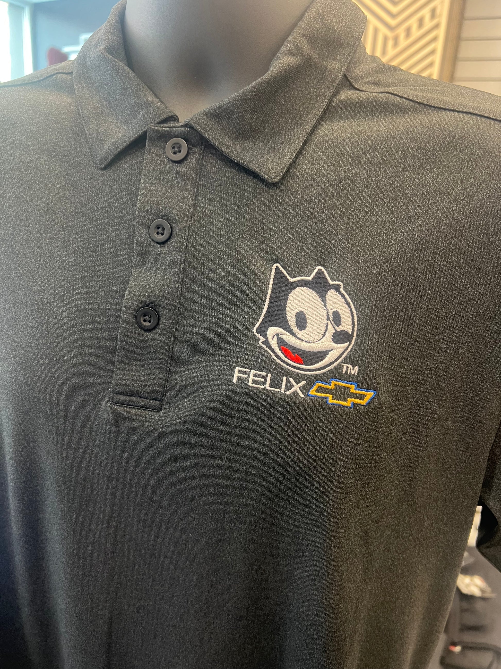 Closeup embroidery detail on Felix Boulevard Polo